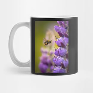 Bumblebee in Flight with Purple Lupin Flowers Mug